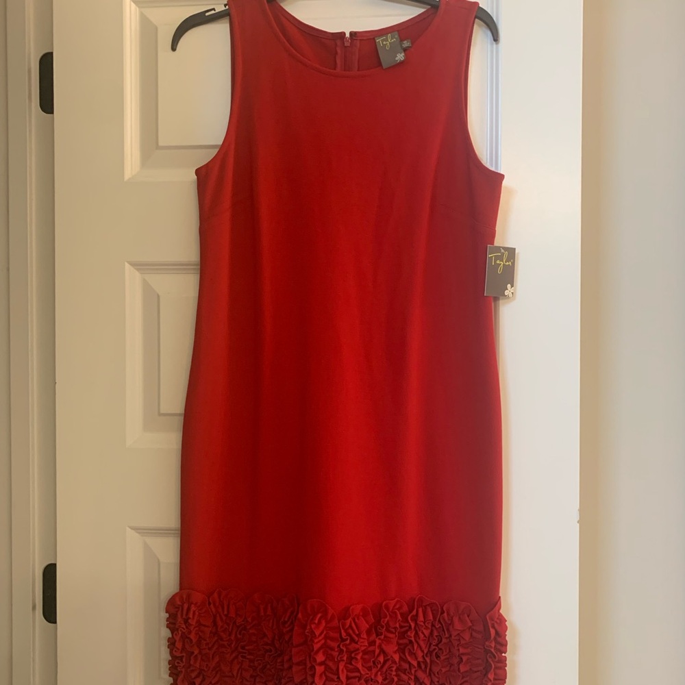 Red dress with ruffle around bottom. Size 10. NWT